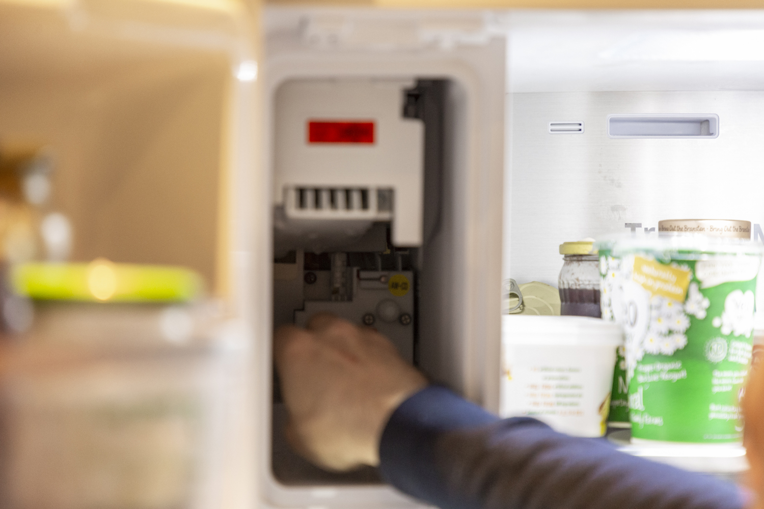 Domex engineer inspecting ice maker