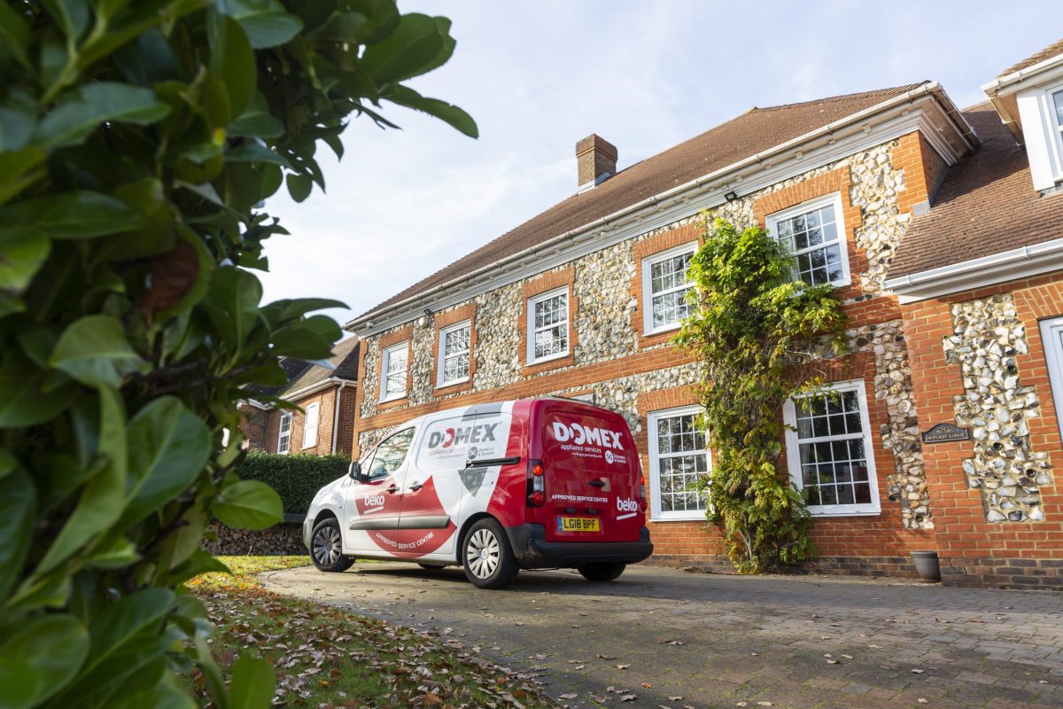 Domex van outside customers house to install washing machine